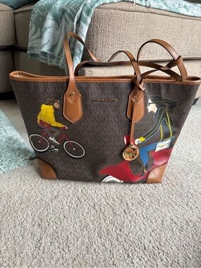 Michael Kors Brown Printed Signature Tote with Riders